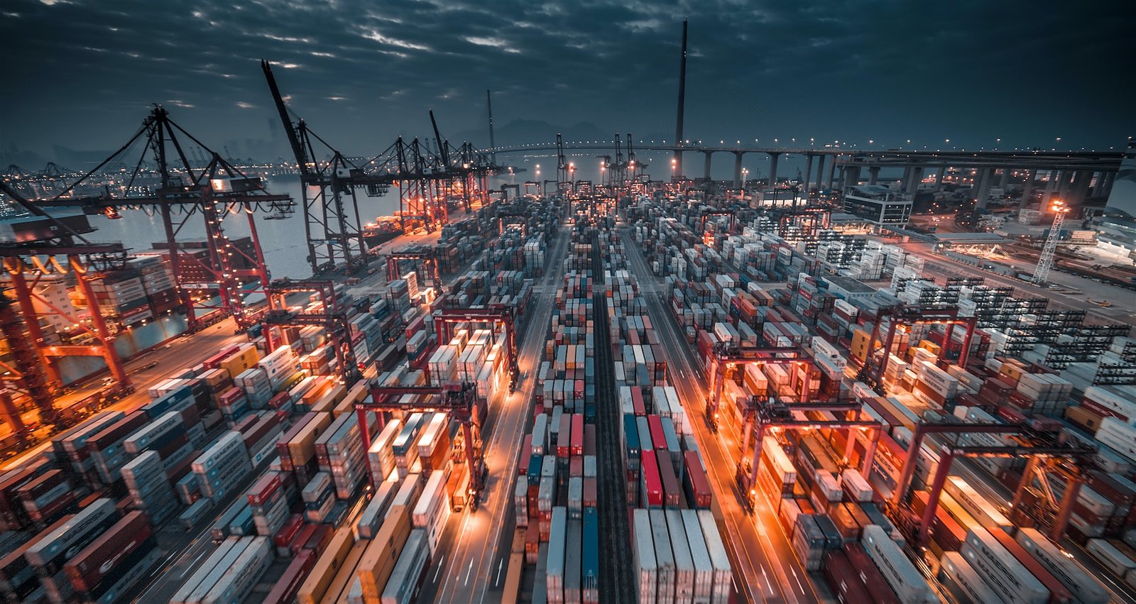 A harbor in the night with multiple containers